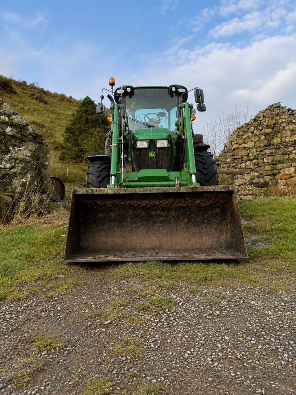 Close-up of a John Deere tractor at work